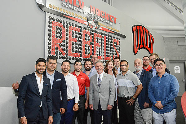 VGK President Kerry Bubolz with UNLV Hockey Staff and Board Members