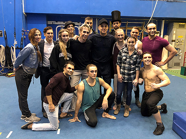 Robbie Williams poses with cast members of One Night for One Drop March 7