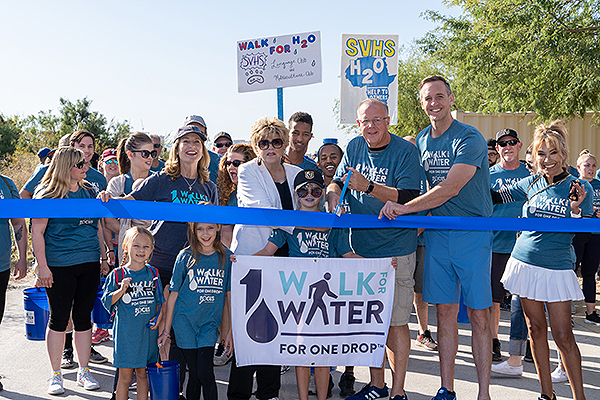 Mayor Carolyn Goodman Jerry Nadal and Brian Kunec cut the ribbon at Walk for Water 2019 Sept. 21