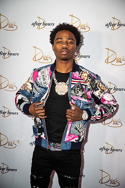 Roddy Ricch poses on the red carpet at Drais Nightclub