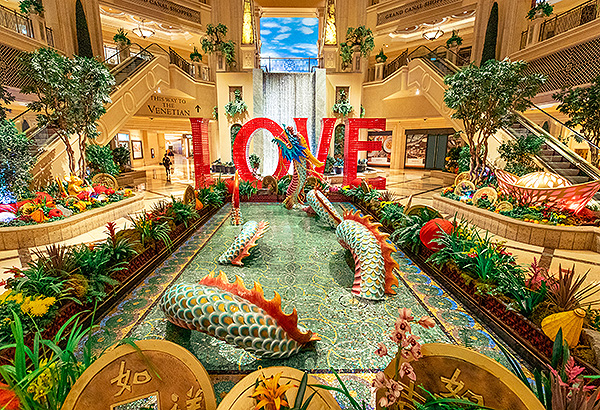 A dragon that spans 18 feet adorns the infinity pond in the waterfall atrium at The Venetian Resort Las Vegas