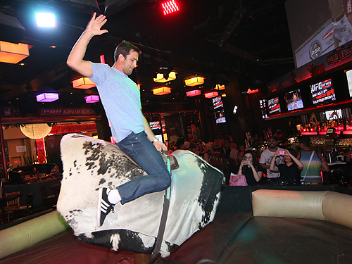 Luke Rockhold rides the bull at PBR Rock Bar