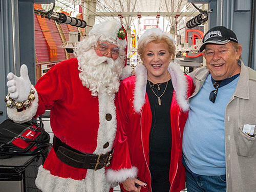 Robin Leach Mayor Goodman and Santa made it across SlotZilla to donate 10000 12.2.14 photo credit Tom Donoghue Photography