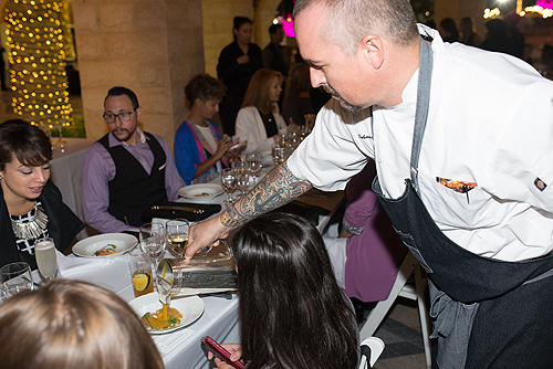 Chef Johnny Church pouring his course for the event for guests Credit Andrew James