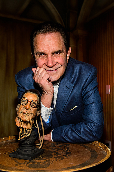 Rich Little and his shrunken head at The Golden Tiki