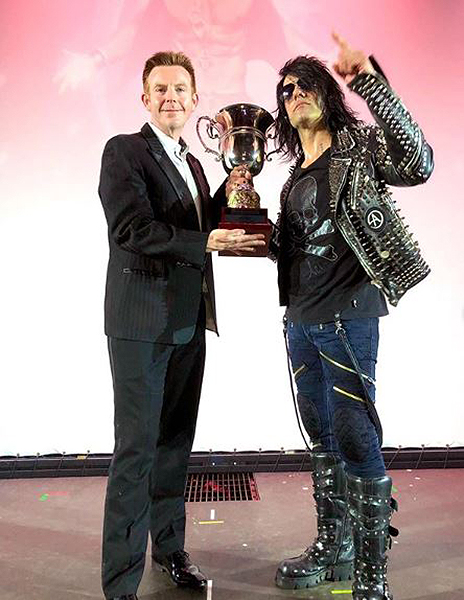 Criss Angel Accepts Award From Celebrity Radio on May 24 2019 after MINDFREAK at Planet Hollywood