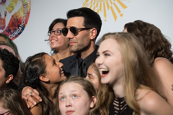 Criss Angel and The Choir Fighters on the gold carpet at Criss Angel HELP Sept 12 2016 Tom Donoghue